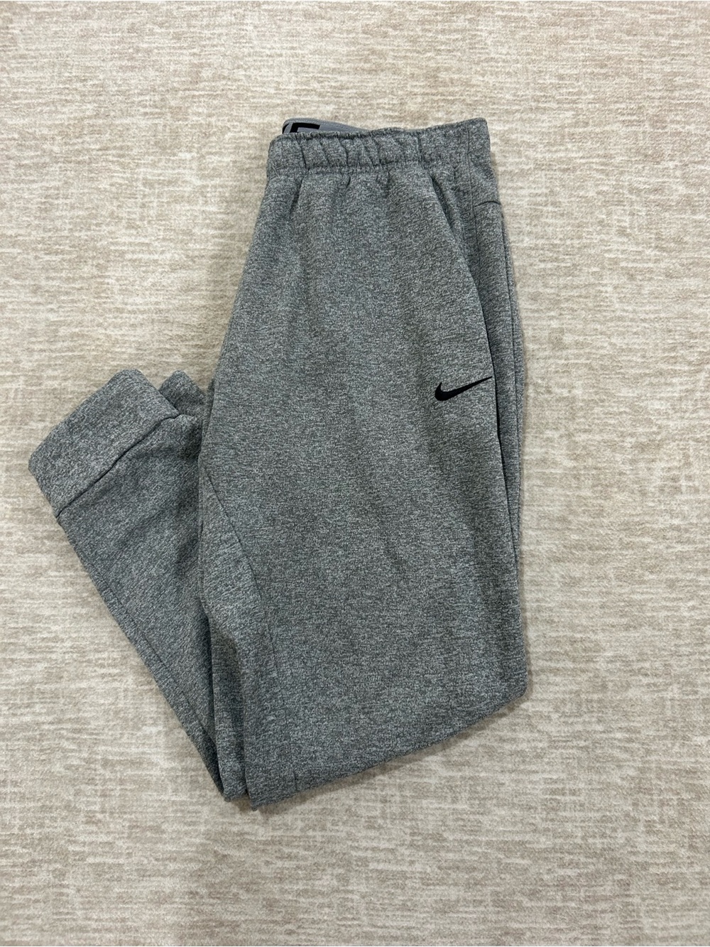 Nike Men’s Gray Heather Fleece Joggers with Black Swoosh